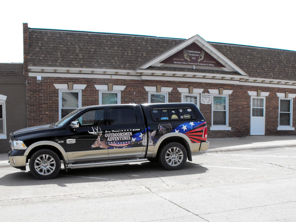 Office front of the building with Dodge truck