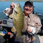 Co-Host Larry Myhre with a Lake Sharpe, SD Smallmouth Bass